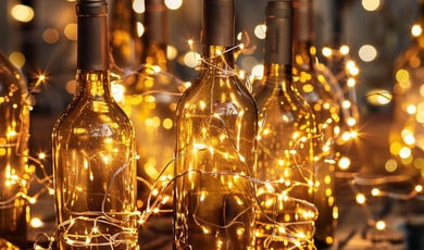 Wine bottles containing fairy lights